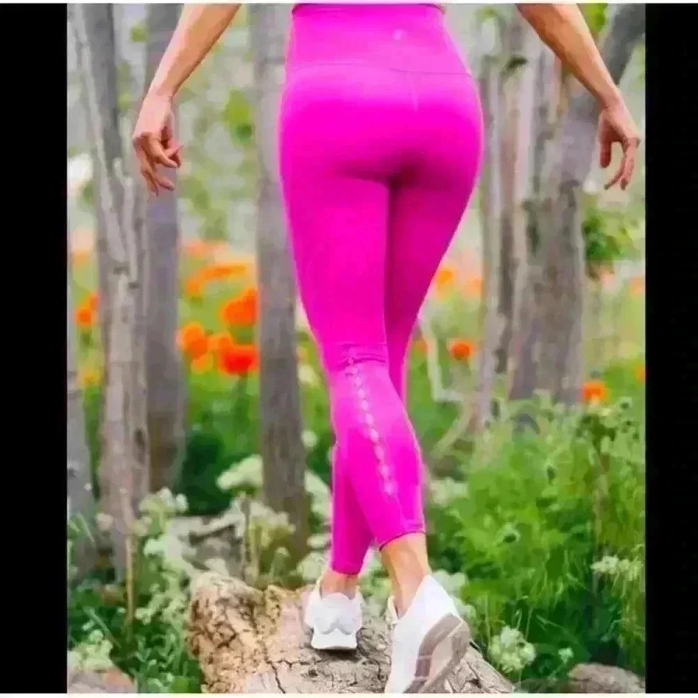 Zyia Leggings-Fuchsia Brilliant Hi-Rise 7/8 w/ peekaboo holes on back of calf.